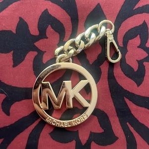 Hold Michel Kors key chain